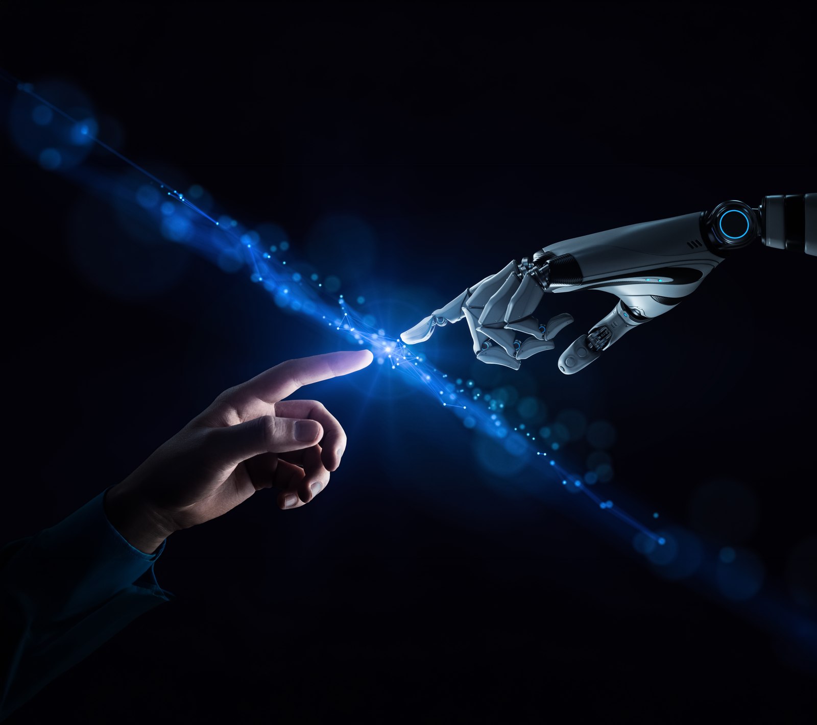 Human hand reaching toward a robotic hand with a glowing digital connection between them, representing OVEEQ's blend of human expertise and advanced technology